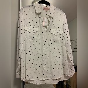 silky button down white blouse with black hearts design. Size XS.